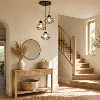 Fyrra diamond cage pendant light, three heads clustered, in a hallway with a staircase | Wickleigh