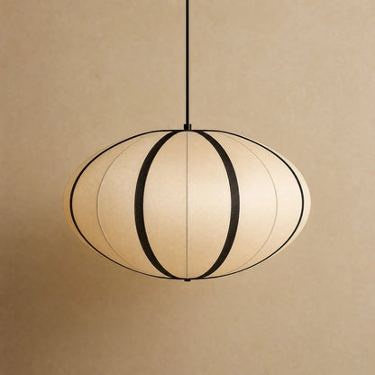 Arnell Japanese silk pendant light, Satin Lantern model, packshot on a warm mineral backdrop | Wickleigh