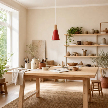 Navlin Scandinavian pendant light, red spindle above a creative studio table | Wickleigh
