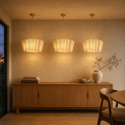 Three Kelen pendant lights on gold rods, Ø 40 cm, lined up above an oak sideboard | Wickleigh
