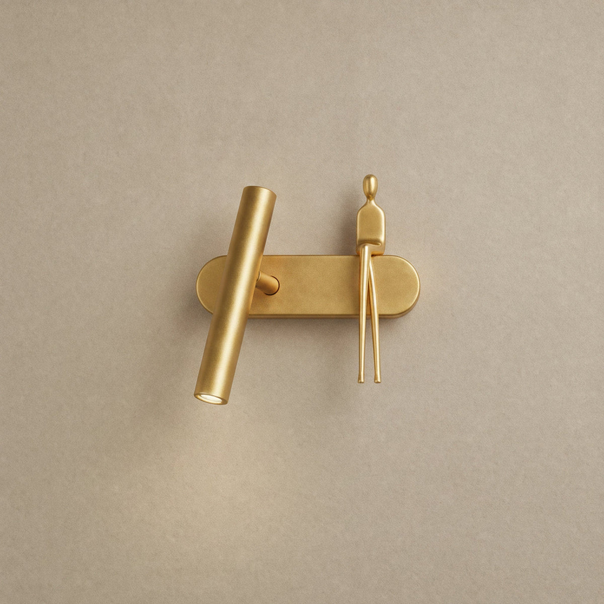 Odron fully gold adjustable wall light, figure on the right | Wickleigh