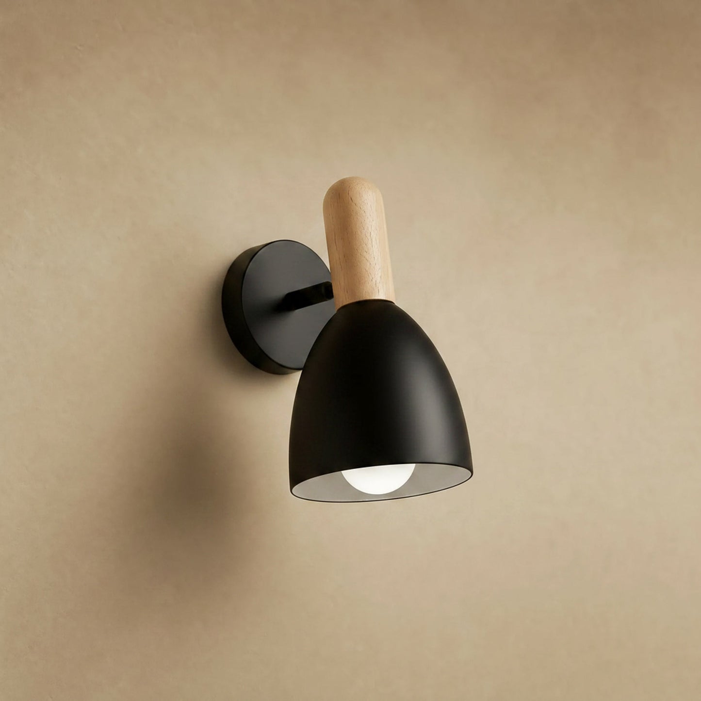 Milna Scandinavian wall light, matt black shade and wall plate, light wood shaft | Wickleigh