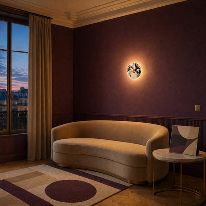 Belna Art Deco wall light lit in a plum stucco living room | Wickleigh