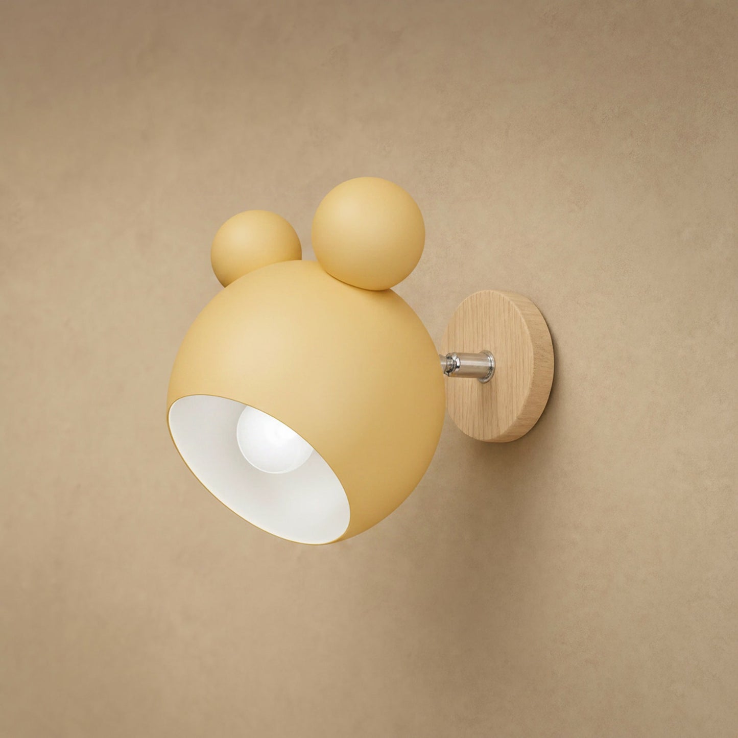 Berrin soft yellow wall light, matt lacquered globe and light wood plate | Wickleigh