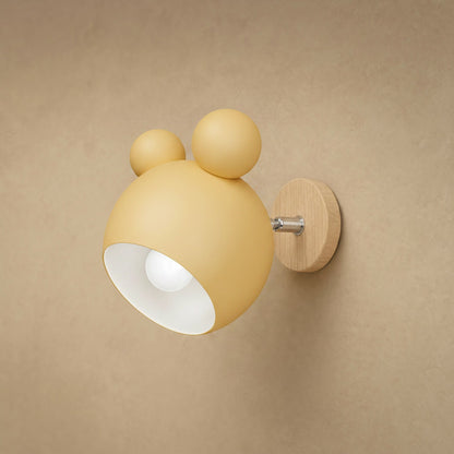 Berrin soft yellow wall light, matt lacquered globe and light wood plate | Wickleigh