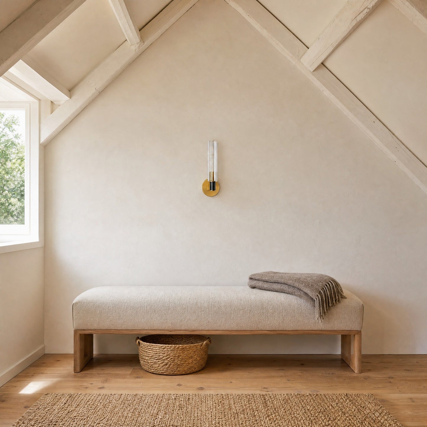 Calin single-light wall light unlit above a linen bench, attic bedroom in daylight | Wickleigh