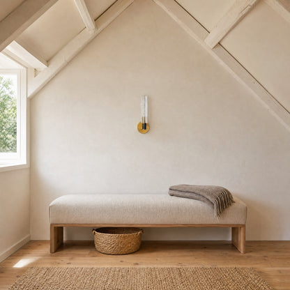 Calin single-light wall light unlit above a linen bench, attic bedroom in daylight | Wickleigh