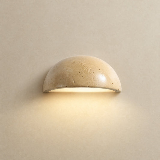 Calvra half-moon wall light lit, natural travertine dome Ø 15 cm | Wickleigh