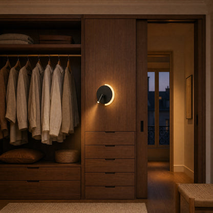 Clenna black dual-light wall light lit in a walnut dressing room at dusk | Wickleigh