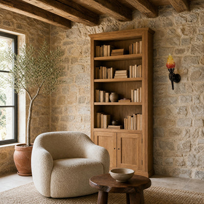 Davren wall light in a library sitting room with exposed stone wall | Wickleigh