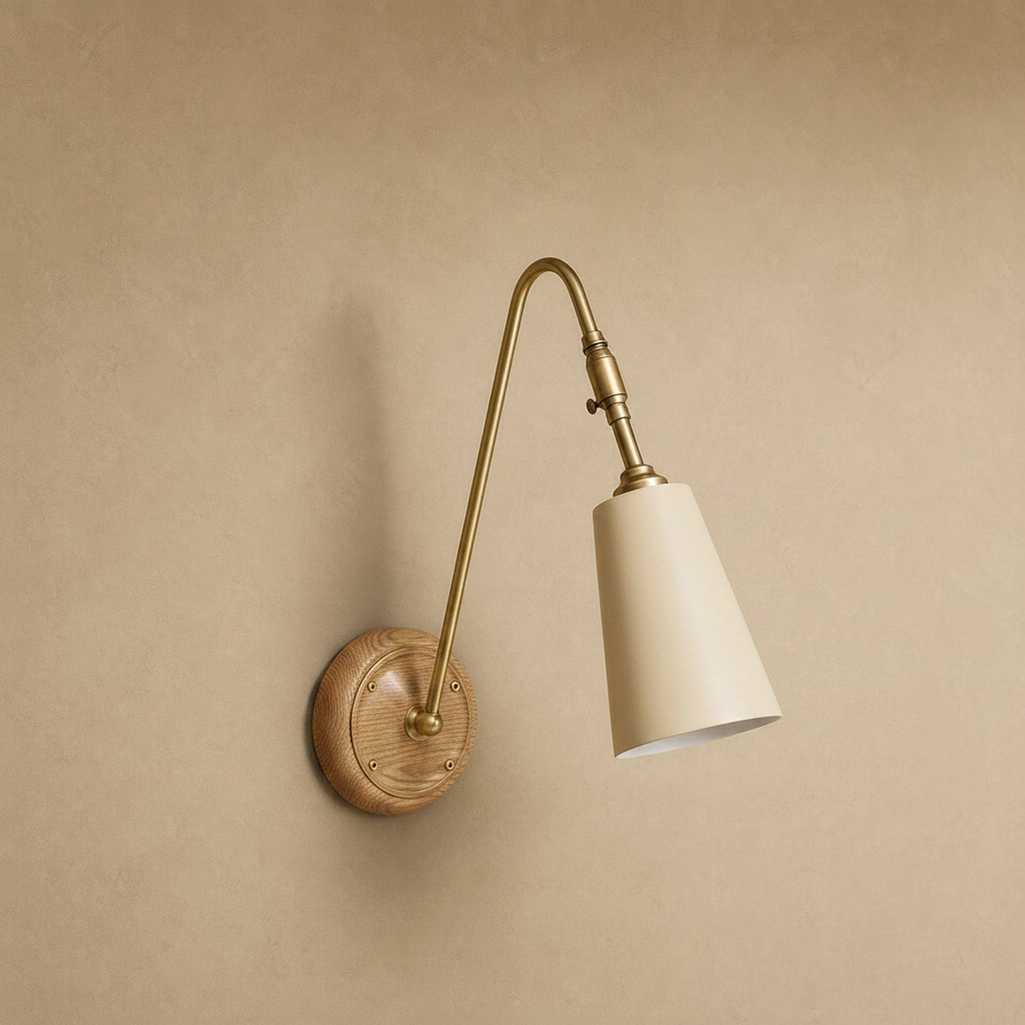 Eilin brass wall light, ecru finish, back plate ringed in light wood | Wickleigh