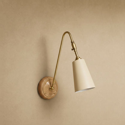 Eilin brass wall light, ecru finish, back plate ringed in light wood | Wickleigh