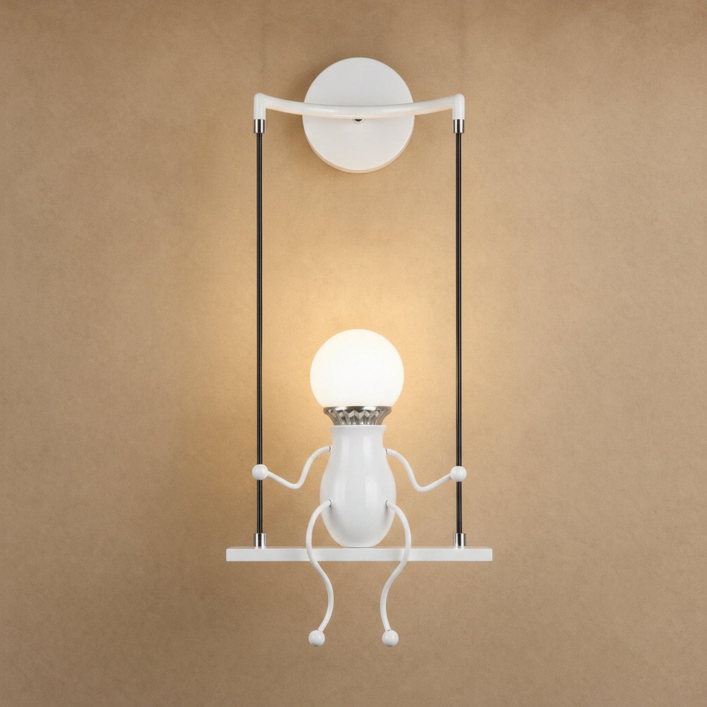 Jyllen white wall light, one figure on its swing | Wickleigh