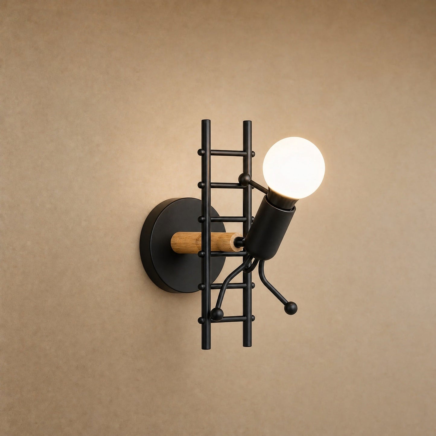 Birna black wall light, little figure climbing a ladder in lacquered iron and light wood | Wickleigh