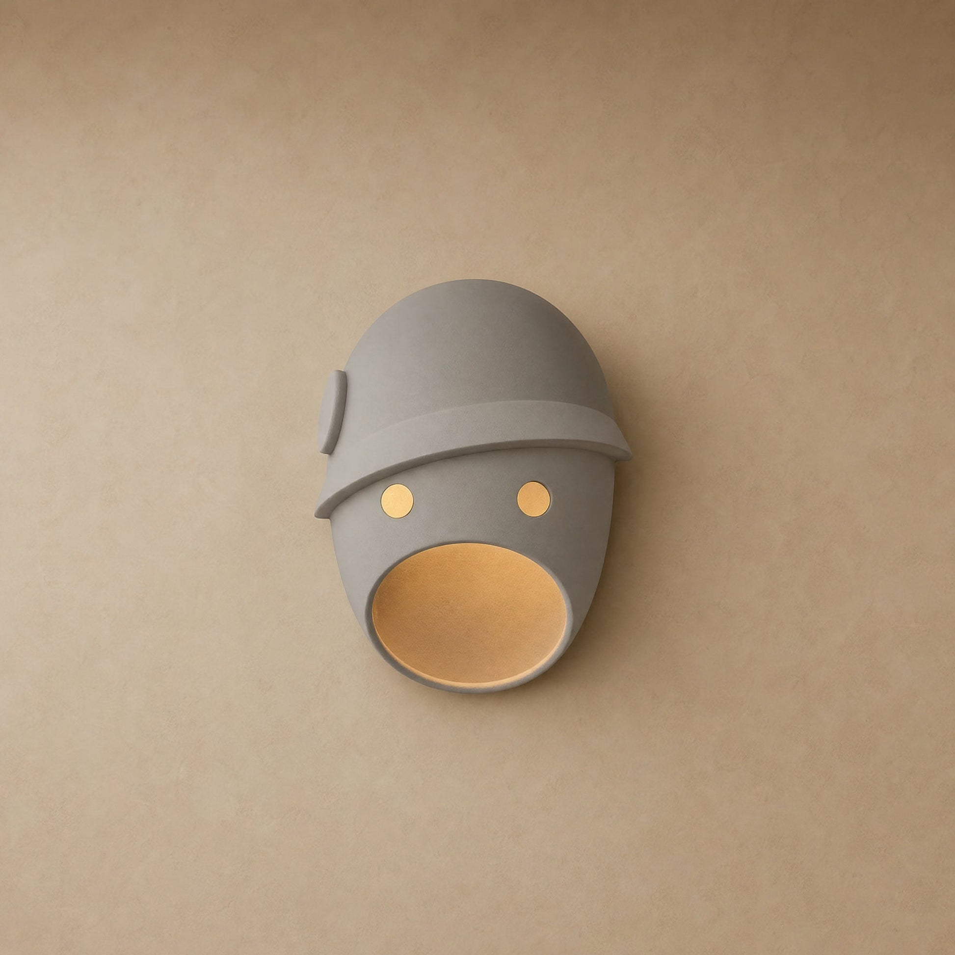 Faelin wall light, sculpted grey matte resin face, Helmet design | Wickleigh