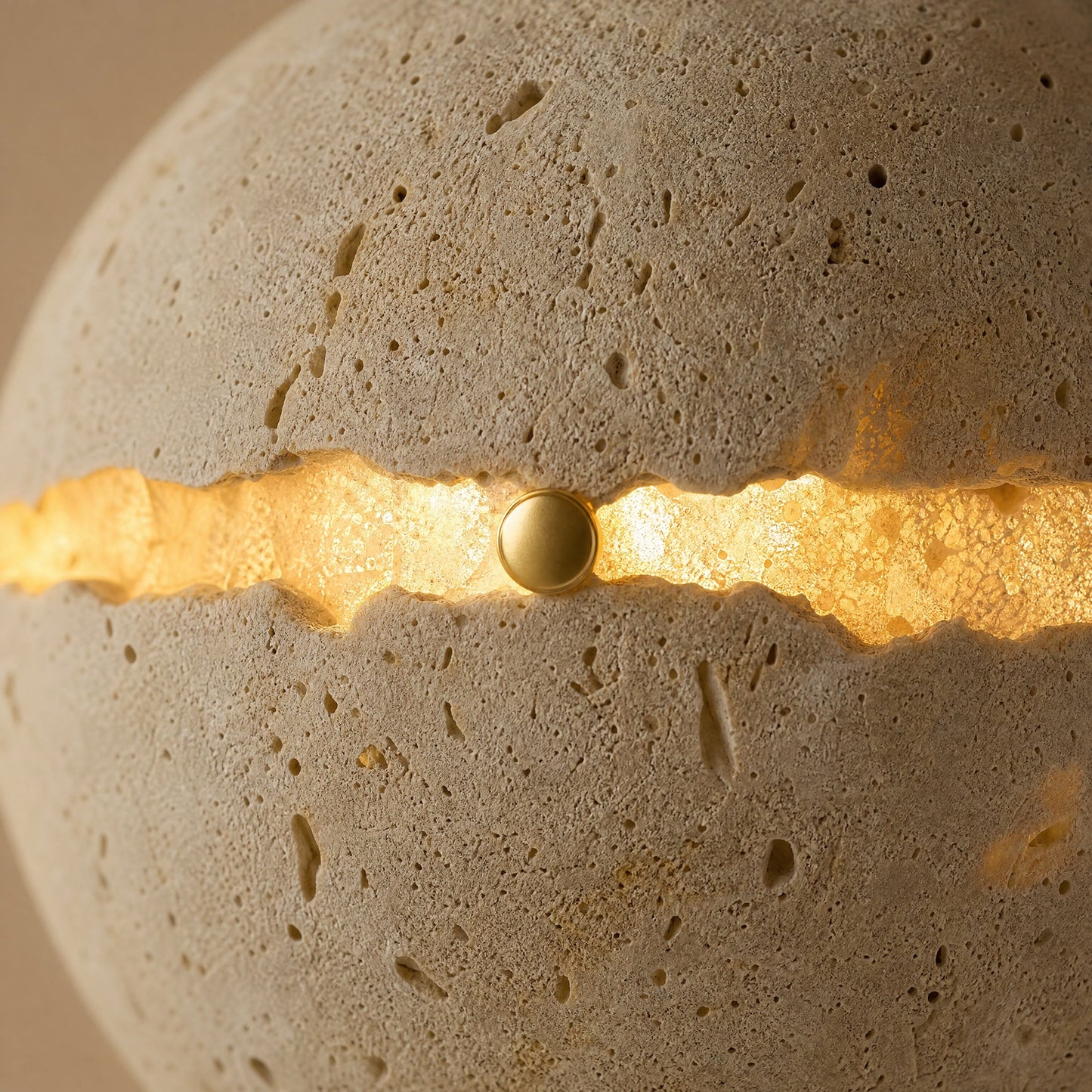 Detail of the lit crack: the travertine turns translucent and glows around the break | Wickleigh