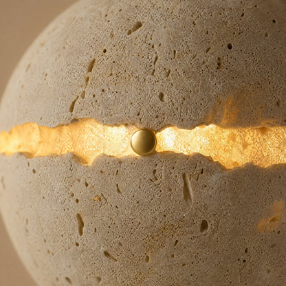 Detail of the lit crack: the travertine turns translucent and glows around the break | Wickleigh