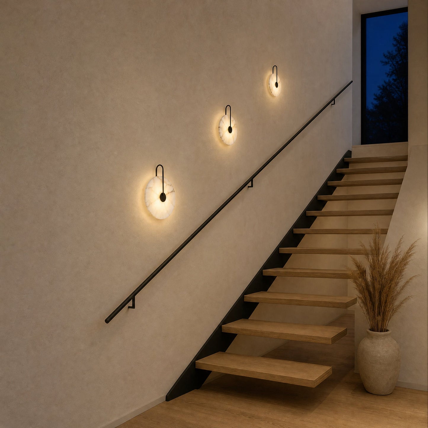Three Henin marble wall lights, Ø 25, 20 and 16 cm, lit along a staircase | Wickleigh