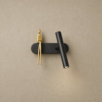 Black And Gold, Figure On The Left