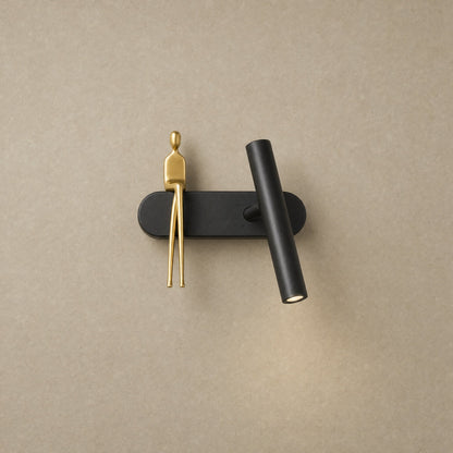 Odron black and gold adjustable wall light, figure on the left | Wickleigh
