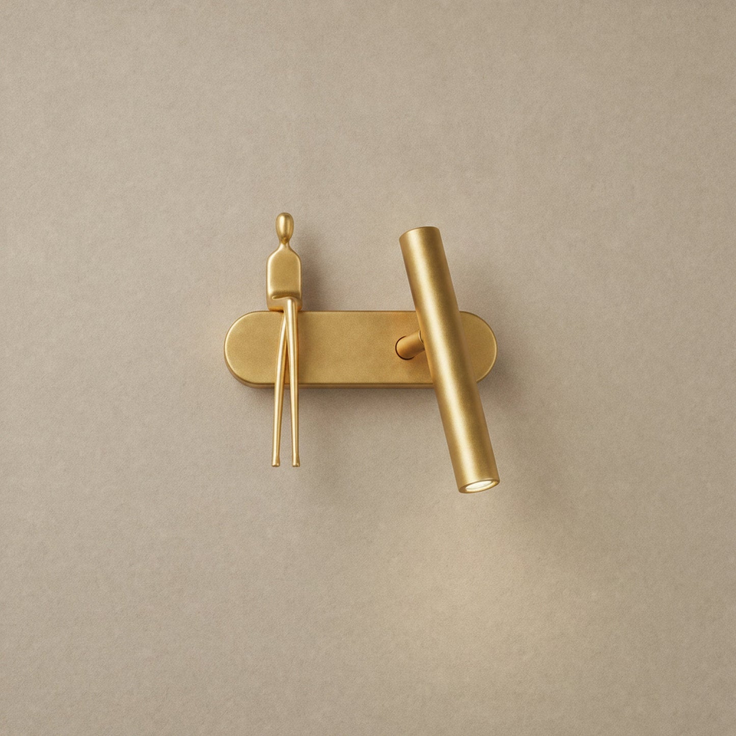 Odron fully gold adjustable wall light, figure on the left | Wickleigh