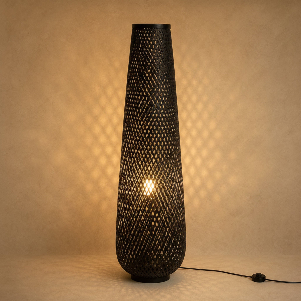 Eirin bamboo floor lamp in black lit, diamond lattice weave | Wickleigh