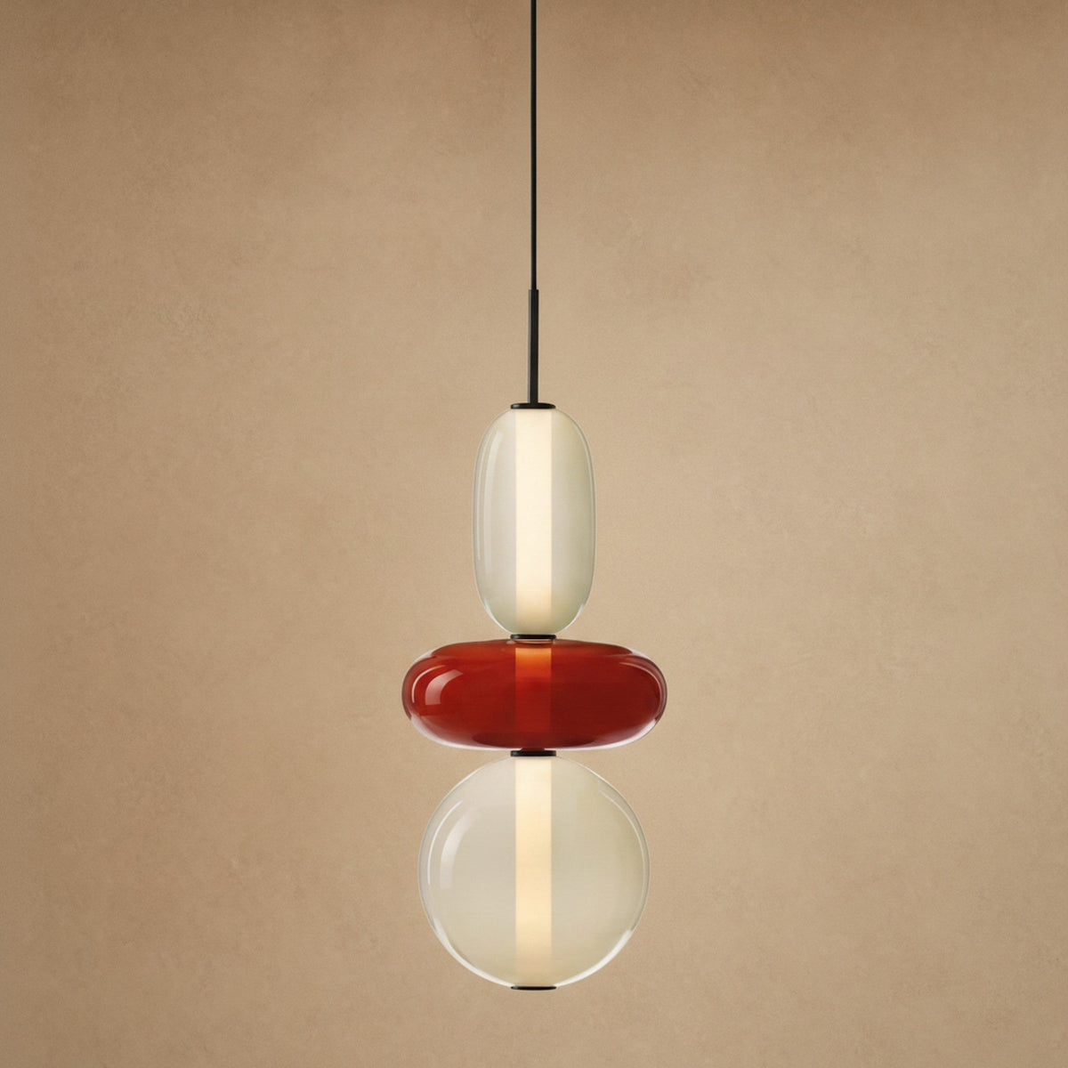 Aslin coloured glass pendant light, three pebble beads in red and cream, height 39 cm | Wickleigh