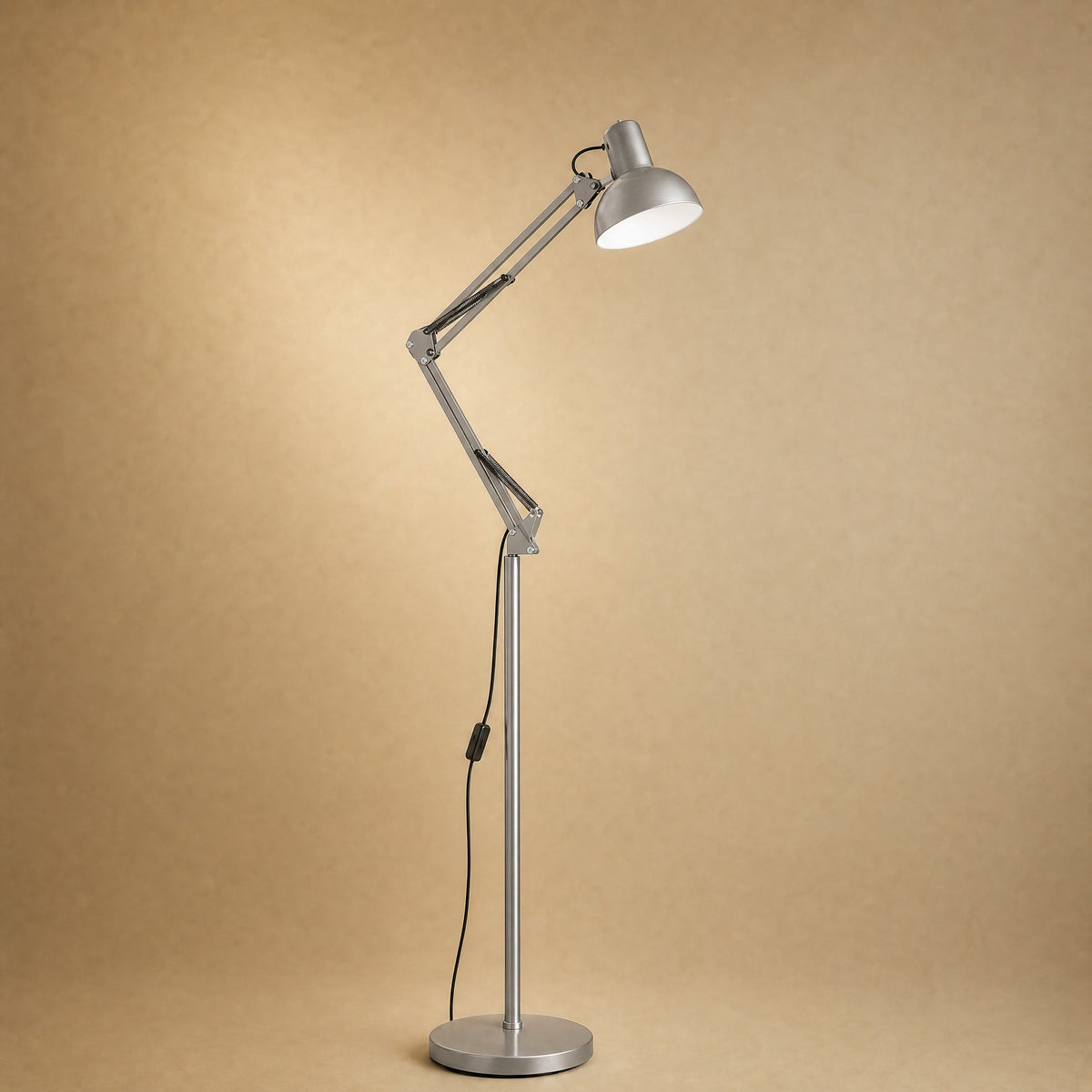 Melen floor reading lamp with articulated arm, brushed silver finish | Wickleigh