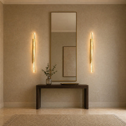 A pair of Frena crystal wall lights framing a hallway mirror | Wickleigh
