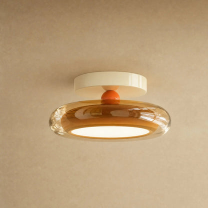 Aswyn ceiling light in amber glass with cream base plate, glass pebble | Wickleigh