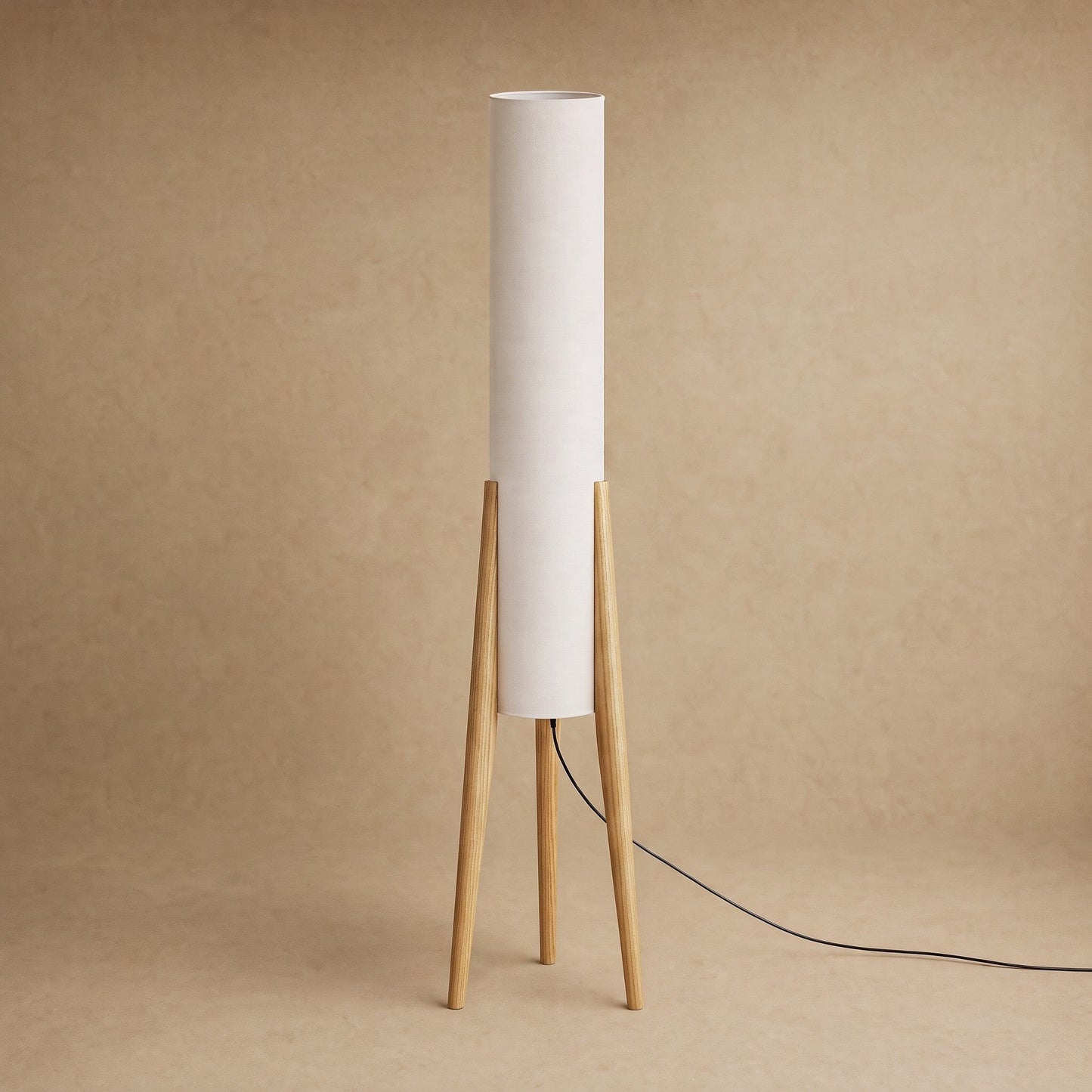 Teira floor lamp in light wood finish, ecru fabric column on a tripod base | Wickleigh