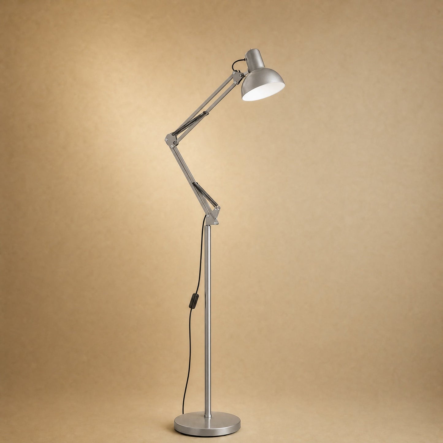 Melen floor reading lamp with articulated arm, brushed silver finish | Wickleigh