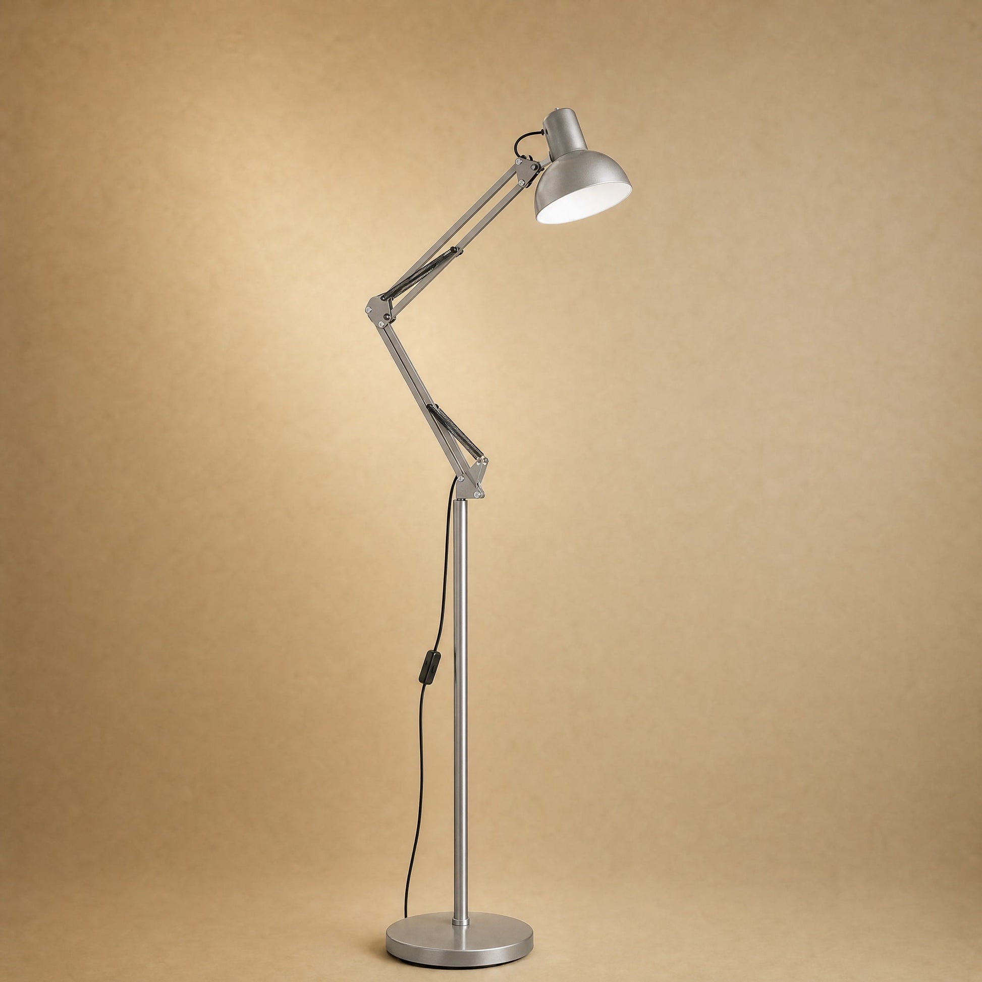 Melen floor reading lamp with articulated arm, brushed silver finish | Wickleigh