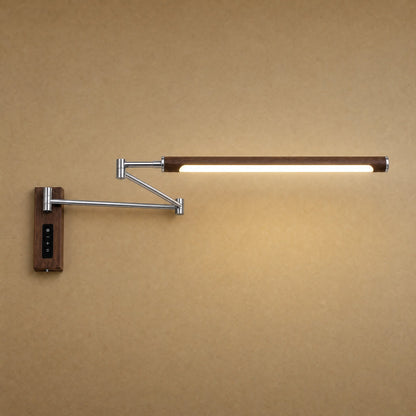 Vinra swing arm wall light in chrome silver finish, walnut-effect head | Wickleigh