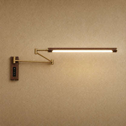 Vinra swing arm wall light in brass gold finish, walnut-effect head, integrated LED | Wickleigh