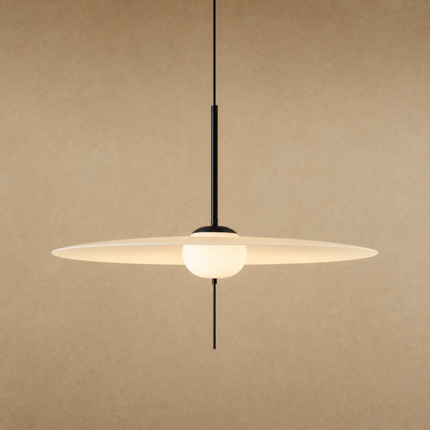 Ylron large pendant light, translucent white acrylic wing pierced by an opal globe, front view | Wickleigh