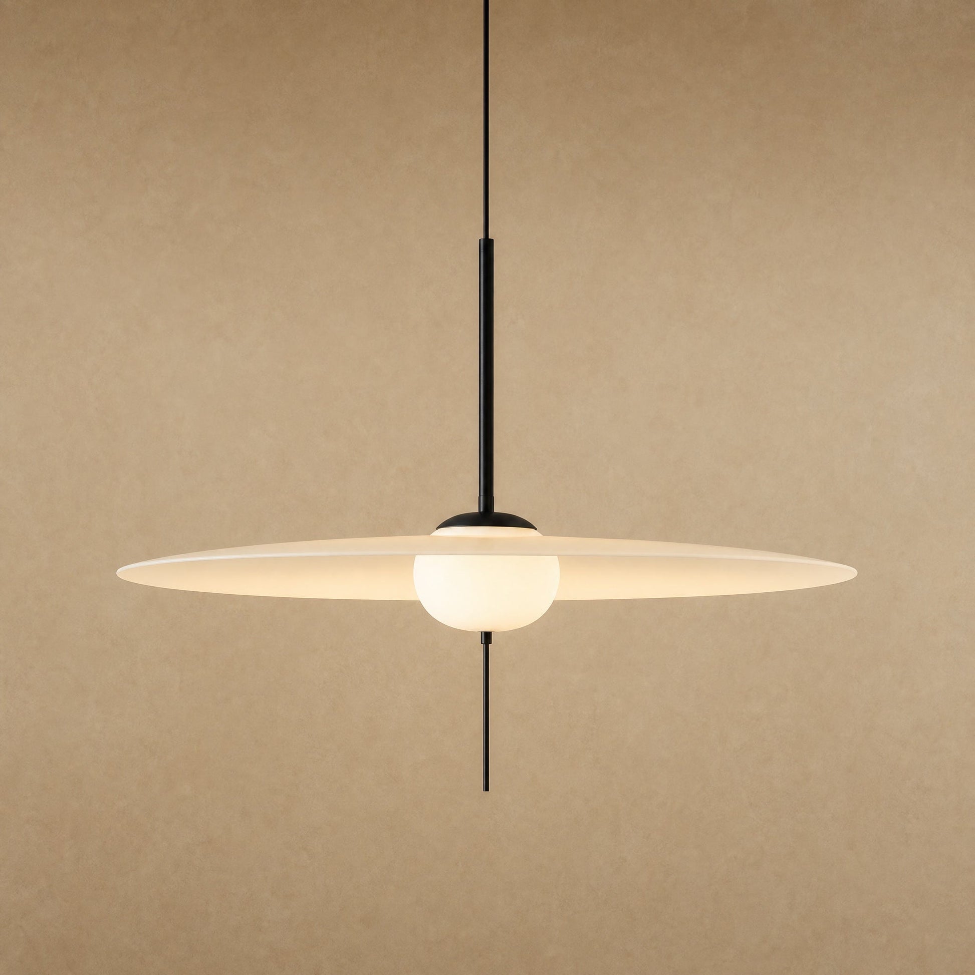 Ylron large pendant light, translucent white acrylic wing pierced by an opal globe, front view | Wickleigh
