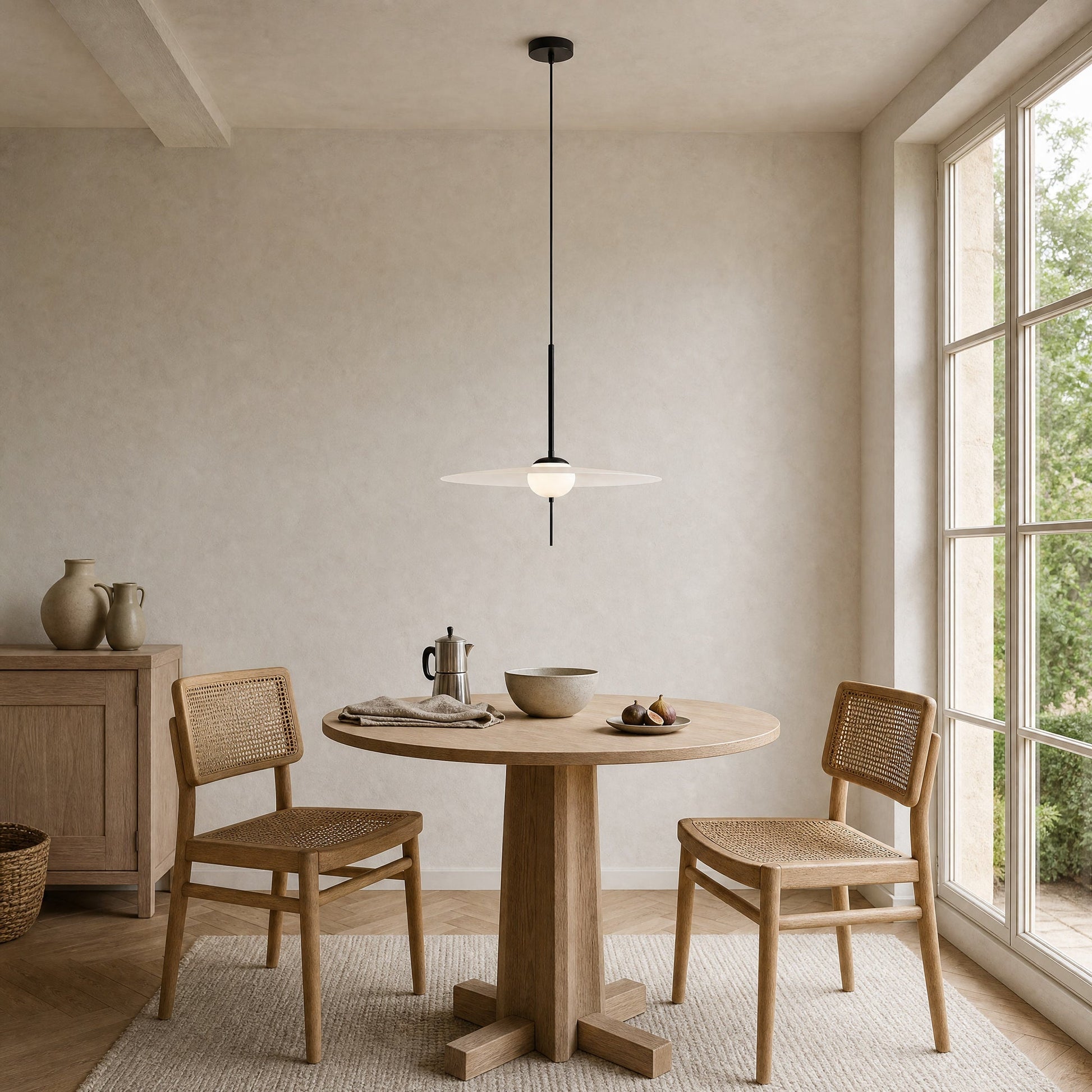 Ylron pendant light above a round breakfast table, in daylight beside the window | Wickleigh