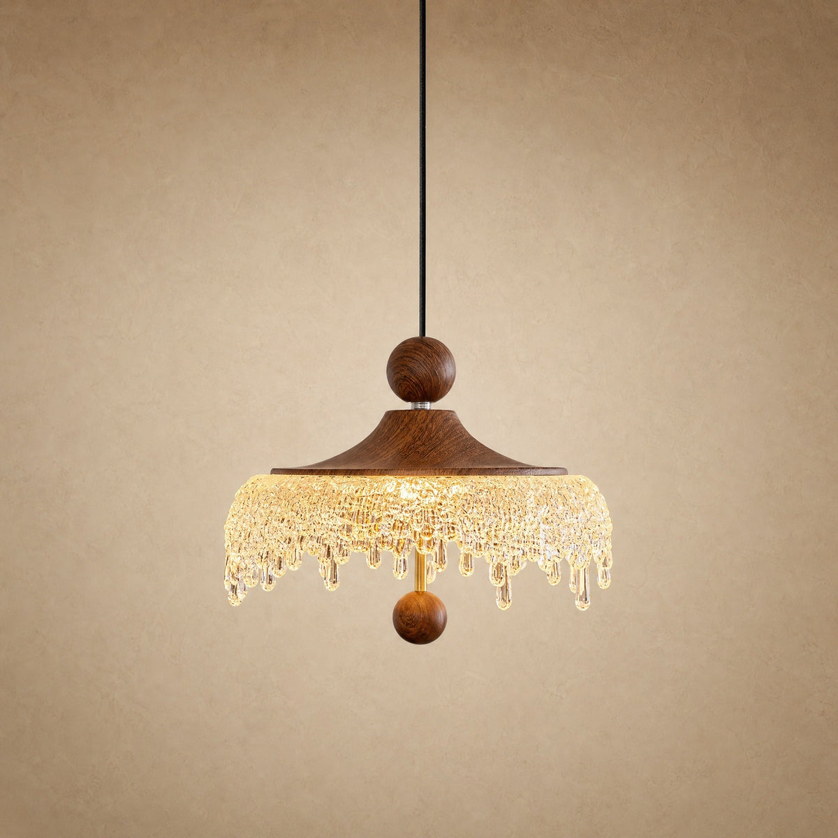 Elmin mini pendant light, walnut wood cap and frosted acrylic fringe, lit | Wickleigh