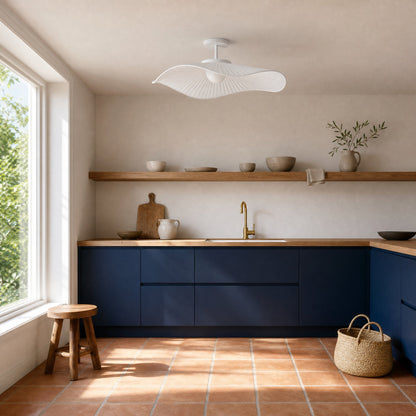 Urven flush ceiling version, white pleated fabric veil on the ceiling of a midnight blue kitchen | Wickleigh
