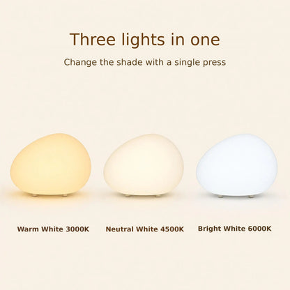 Pebble table lamp light colours: warm, neutral and bright white