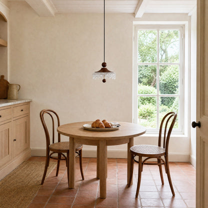 Elmin mini pendant light unlit above a round table, daytime eating corner | Wickleigh