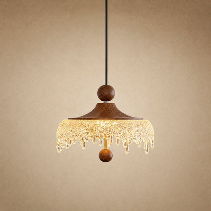 Elmin mini pendant light, walnut wood cap and frosted acrylic fringe, lit | Wickleigh