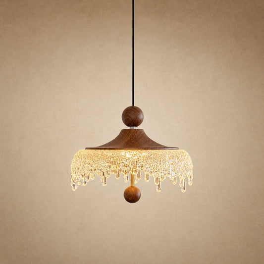 Elmin mini pendant light, walnut wood cap and frosted acrylic fringe, lit | Wickleigh