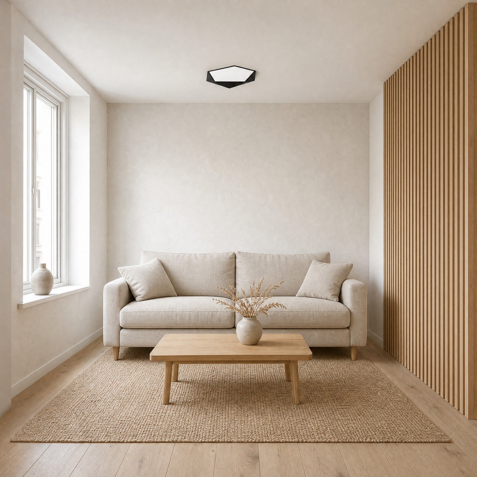 Ostin black flat ceiling light in a small Nordic sitting room with a light oak screen | Wickleigh