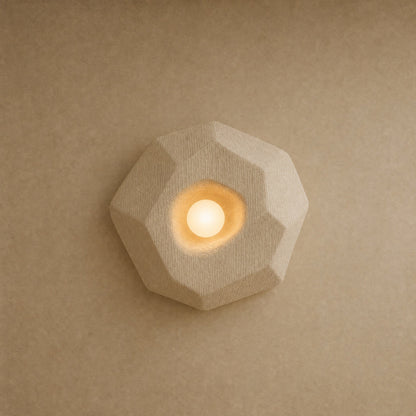 Savlin bedside wall light, ecru faceted Pebble shape 25 x 23 cm, lit | Wickleigh