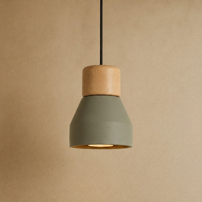 Asena concrete pendant light in Sage Green, raw cone with light wood cylinder | Wickleigh