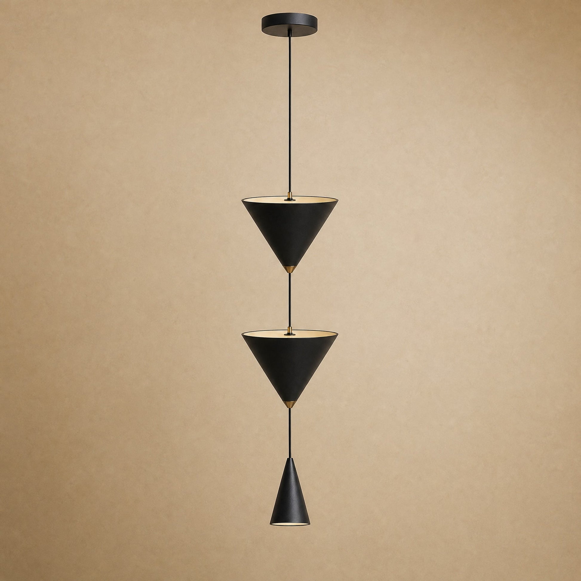 Silna black bedside pendant light, cascade of three cones on a single wire | Wickleigh