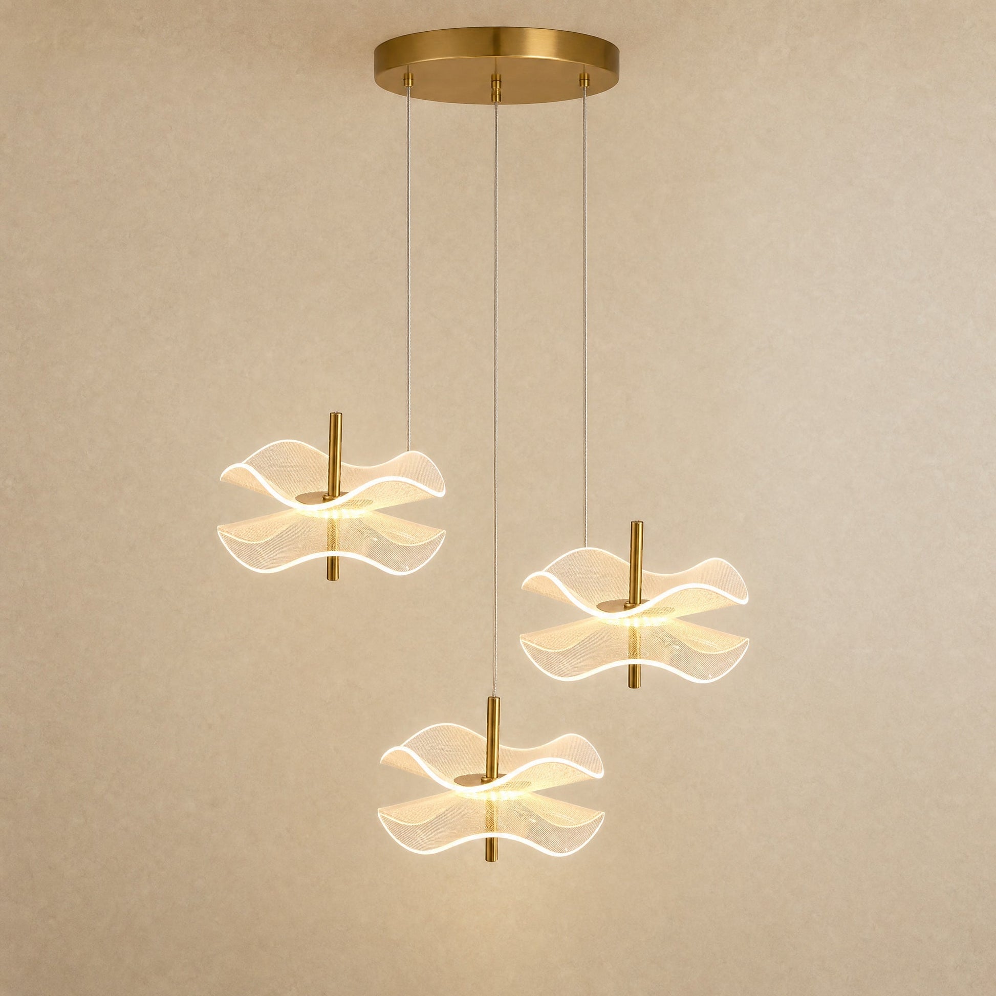Orina flower pendant light, three-head configuration, hung at staggered heights | Wickleigh