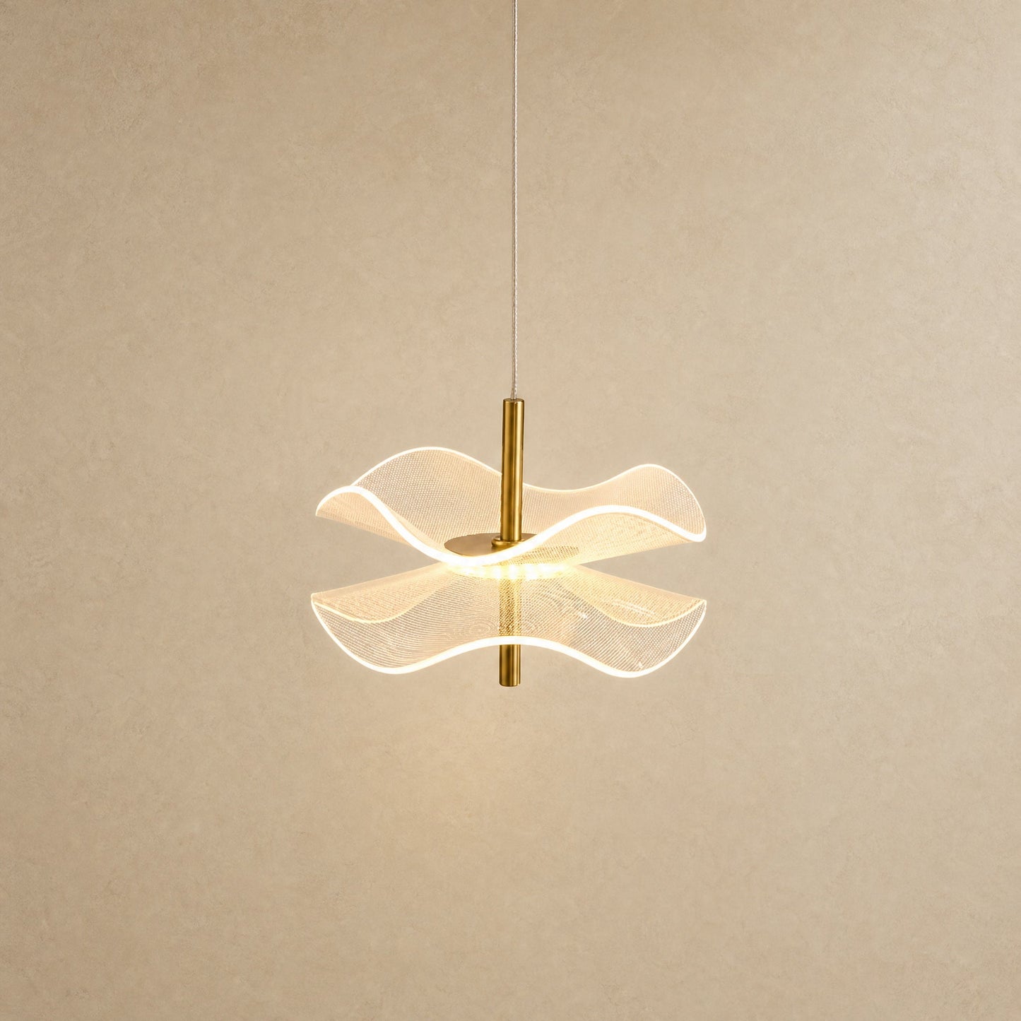 Orina flower pendant light, lit, two rippled acrylic discs on a gold rod | Wickleigh